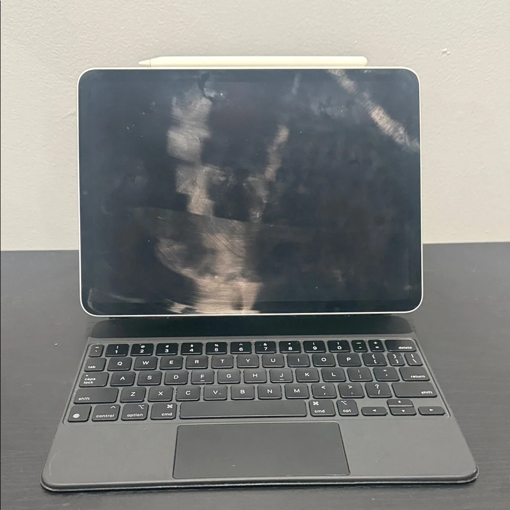 iPad Air with Apple Pencil(new) and Apple Smart Folio Case. Everything works.